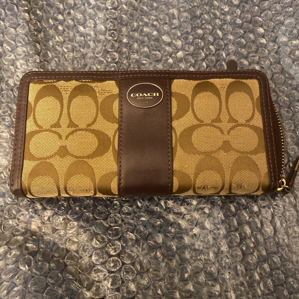 Coach tan and dark brown zippy wallet